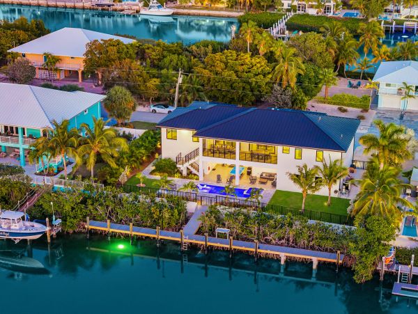 Luxurious Waterfront Retreat in Coco Plum - 5-Bedroom, Private Pool & Dock