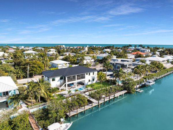 Luxurious Waterfront Retreat in Coco Plum - 5-Bedroom, Private Pool & Dock