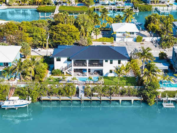 Luxurious Waterfront Retreat in Coco Plum - 5-Bedroom, Private Pool & Dock