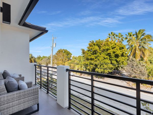 Luxurious Waterfront Retreat in Coco Plum - 5-Bedroom, Private Pool & Dock