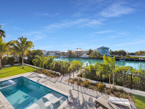 Luxurious Waterfront Retreat in Coco Plum - 5-Bedroom, Private Pool & Dock