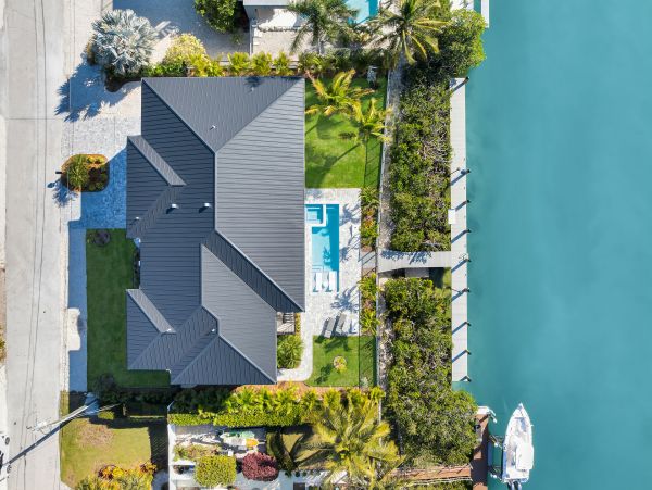 Luxurious Waterfront Retreat in Coco Plum - 5-Bedroom, Private Pool & Dock
