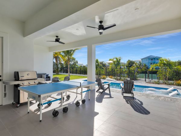 Luxurious Waterfront Retreat in Coco Plum - 5-Bedroom, Private Pool & Dock