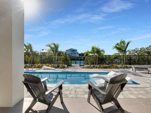 Luxurious Waterfront Retreat in Coco Plum - 5-Bedroom, Private Pool & Dock