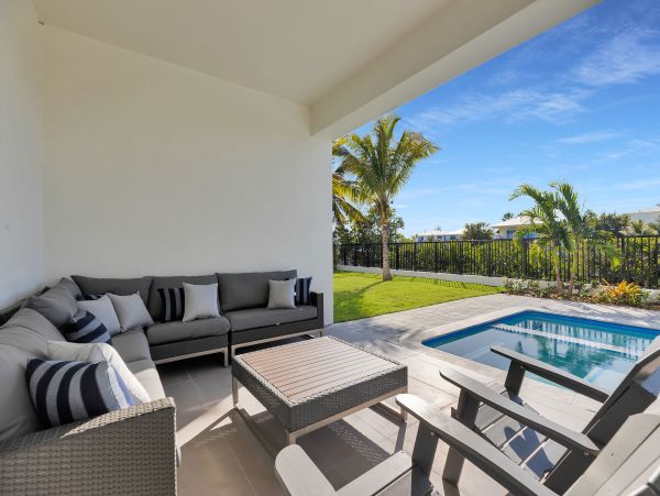 Luxurious Waterfront Retreat in Coco Plum - 5-Bedroom, Private Pool & Dock
