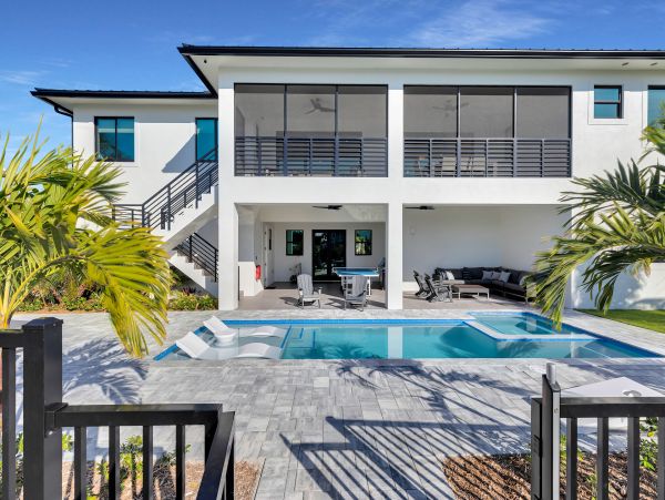 Luxurious Waterfront Retreat in Coco Plum - 5-Bedroom, Private Pool & Dock