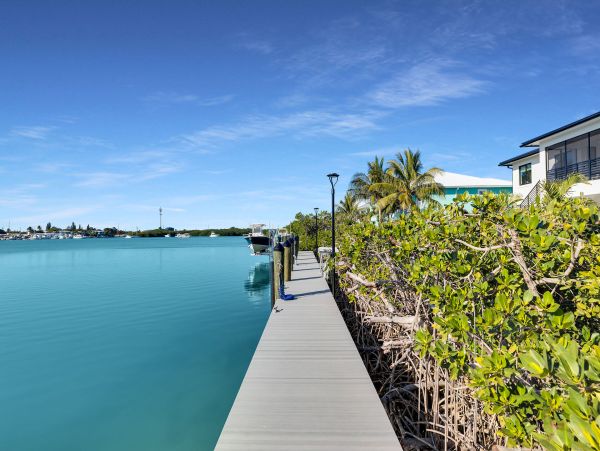Luxurious Waterfront Retreat in Coco Plum - 5-Bedroom, Private Pool & Dock