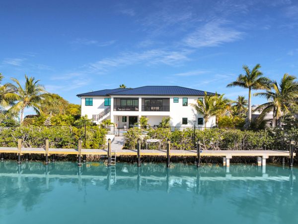 Luxurious Waterfront Retreat in Coco Plum - 5-Bedroom, Private Pool & Dock