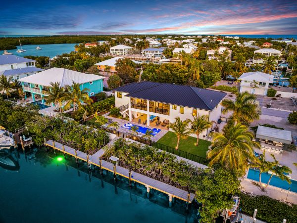 Luxurious Waterfront Retreat in Coco Plum - 5-Bedroom, Private Pool & Dock
