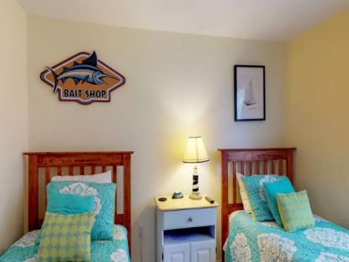 3 Bedroom Vacation Rental Sleeps 8 Guests Steps onto Sand
