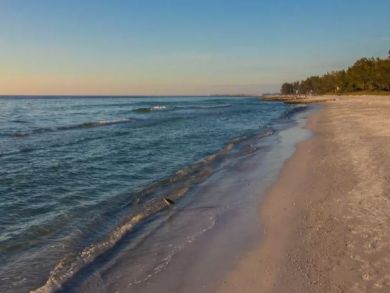 3 Bedroom Vacation Rental Sleeps 8 Guests Steps onto Sand
