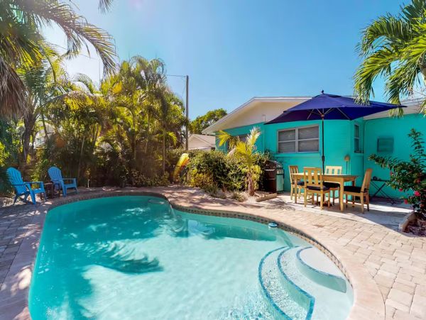 Island Charm Retreat - Classic Cottage with Pool, Steps to Beach