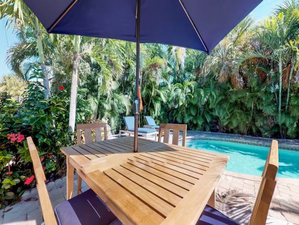 Island Charm Retreat - Classic Cottage with Pool, Steps to Beach