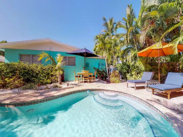 Island Charm Retreat - Classic Cottage with Pool, Steps to Beach