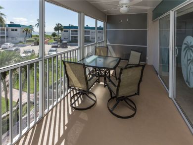 Screened Balcony with Outdoor Furniture