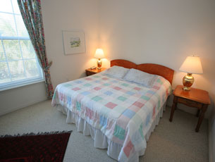 Master bedroom with king bed Master bedroom with king bed
