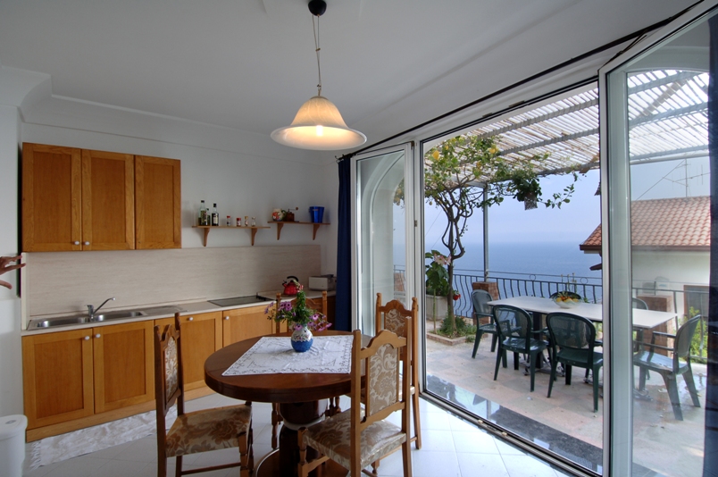 Kitchen with doors to terrace