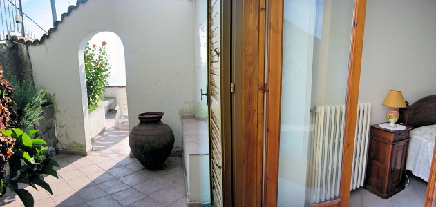 Doors from the Bedroom Lead to the Terrace