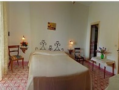 Bedroom with matrimonial bed