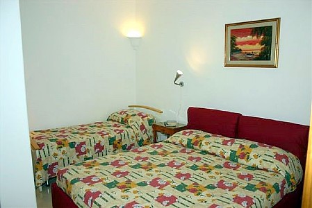 Bedroom with Double and Twin Beds