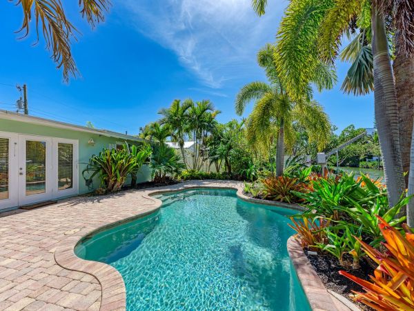 Waterfront Vacation Rental Anna Maria Island - Canal-Front Home with Pool & Dock