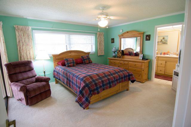 Master bedroom with queen bed