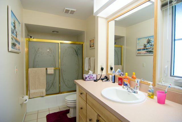 Bathroom with tub and shower