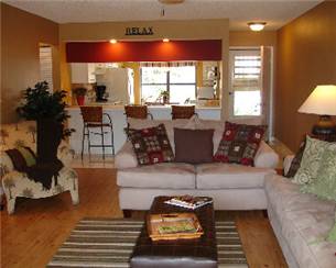 Open plan living room and dining area at Anna Maria Rental
