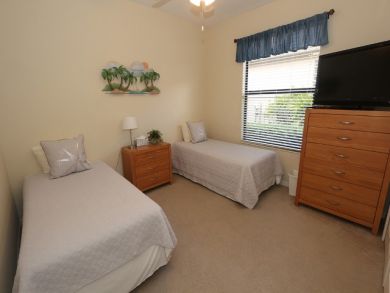 Twin Bedroom with TV