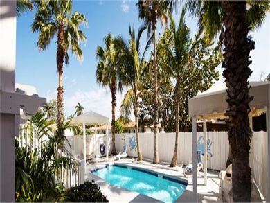 ONE BEDROOM BEACH  CONDO One Level Walk steps to Gulf Water