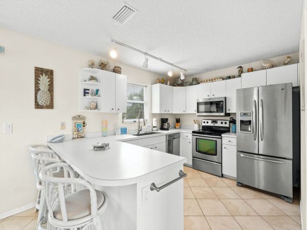 Holmes Beach Charming Three Bedroom Vacation Home- Canal Front