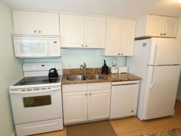 Sleep 6 Guests at this Two Bedroom Beach Condo Shared Pool