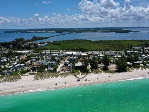 Beachfront Elegance with Direct Access and Gulf Views in Holmes Beach