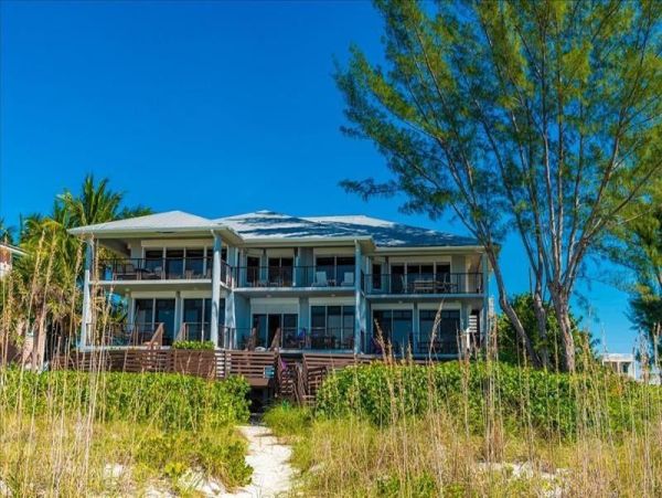 Beachfront Elegance with Direct Access and Gulf Views in Holmes Beach