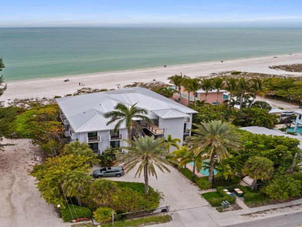 Beachfront Elegance with Direct Access and Gulf Views in Holmes Beach