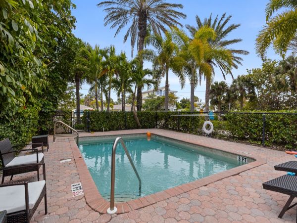 Beachfront Elegance with Direct Access and Gulf Views in Holmes Beach