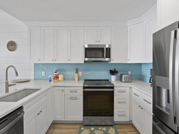 Beachfront Elegance with Direct Access and Gulf Views in Holmes Beach