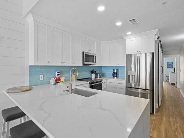 Beachfront Elegance with Direct Access and Gulf Views in Holmes Beach