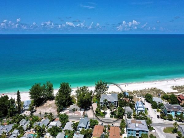 Beachfront Elegance with Direct Access and Gulf Views in Holmes Beach