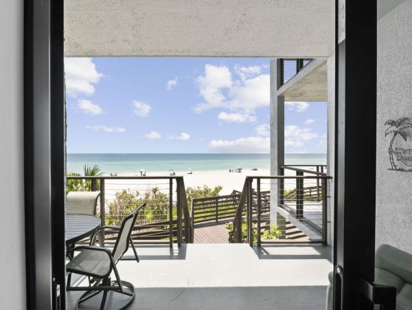 Beachfront Elegance with Direct Access and Gulf Views in Holmes Beach