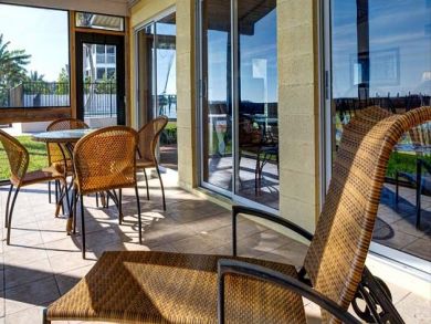 Screened porch with outdoor furniture