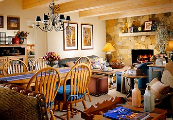Sample living and dining room with fireplace