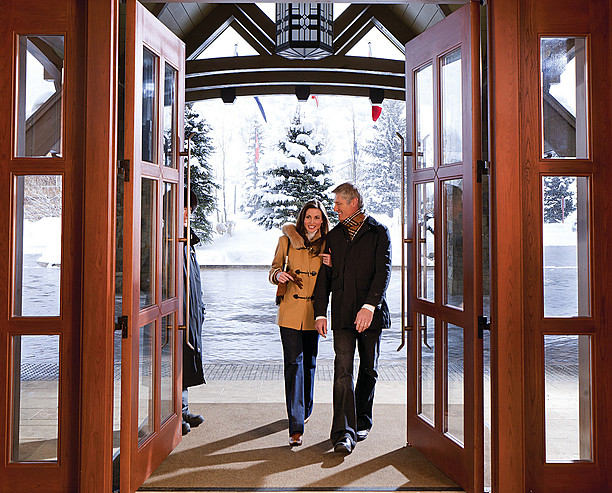 couple entering vail hotel couple entering vail hotel