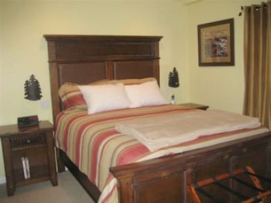Sample bedroom with queen bed