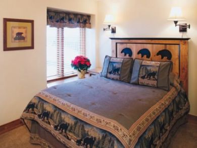 Sample bedroom with queen bed