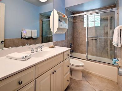 Bathroom with shower in tub
