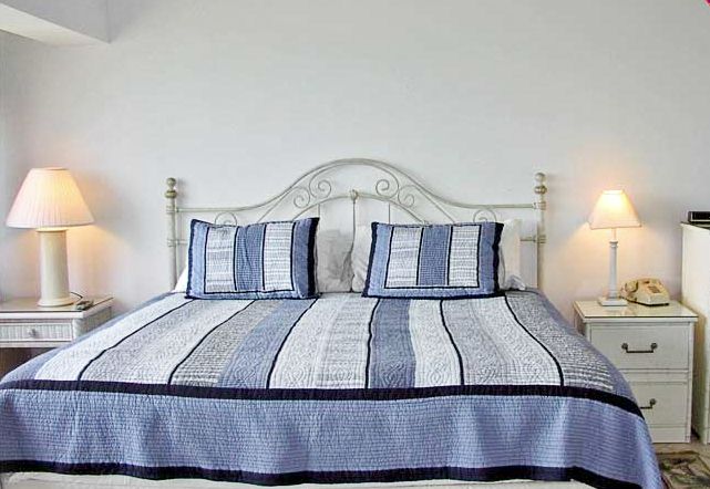 Master bedroom with king bed Master bedroom with king bed