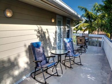Sun deck with rocking chairs & table set