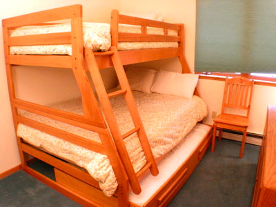 Bedroom 3 has one set of bunk beds with trundle Bedroom 3 has one set of bunk beds with trundle