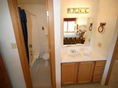 Bathroom with tub and shower